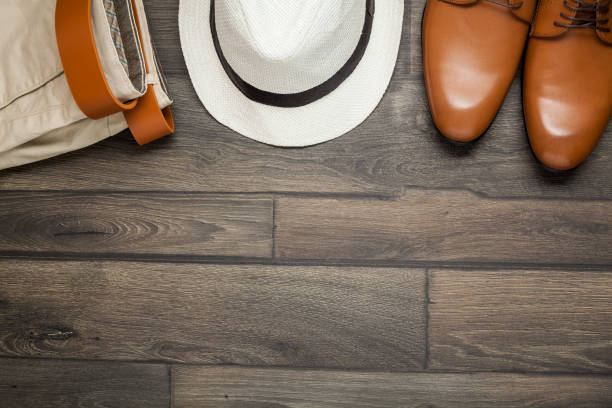 istock Leather brown shoes, white hat 917163884