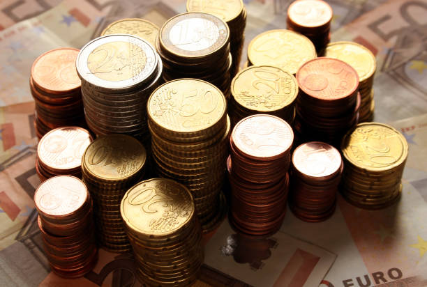 istock Stacks of Euro coins and banknotes 91716507