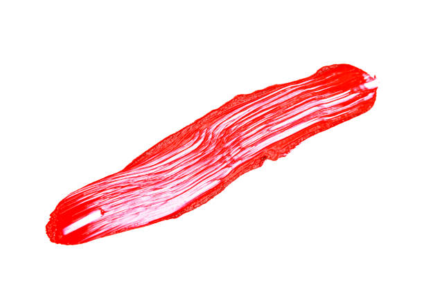 Red color lipstick stroke on white background