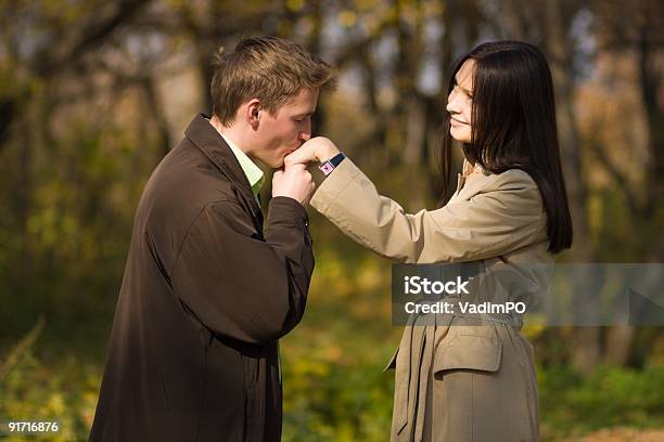 Young Romantic Man Kissing Girls Hand Stock Photo - Download Image Now - Adult, Adults Only, Affectionate