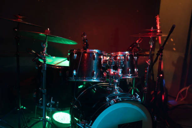 istock Drum set in the light club lights 917169512
