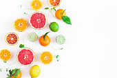 Colorful fresh fruits on white table. Flat lay, top view