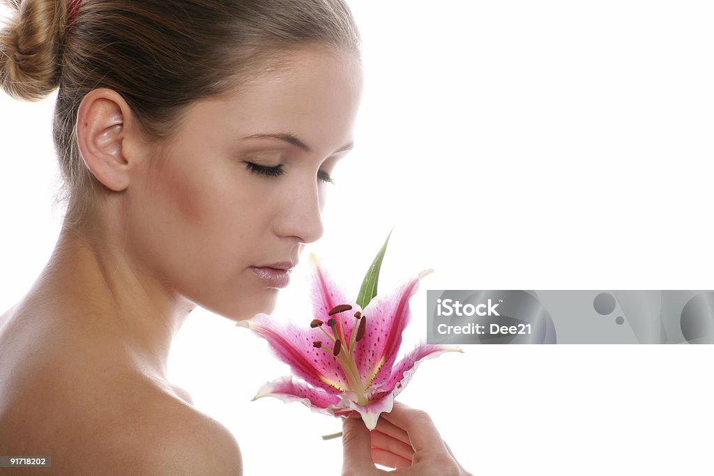 Aislado Retrato de belleza de una mujer con flor - Foto de stock de Actividades recreativas libre de derechos