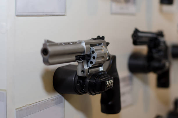 istock Gun wall rack with revolver 917183552