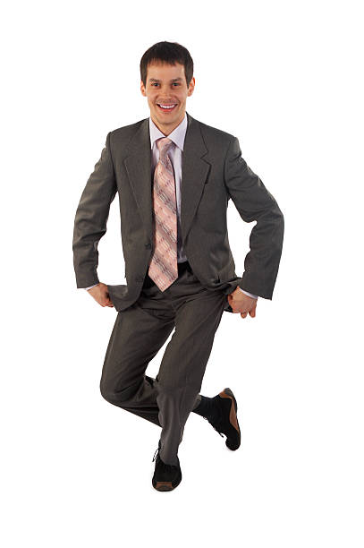 Young businessman curtsey stock photo