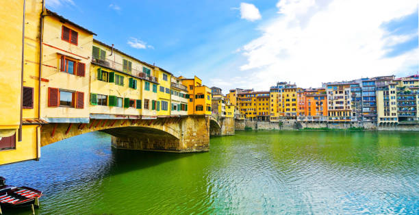 istock Old Bridge across the Arno River in Florence on a sunny day 917189130