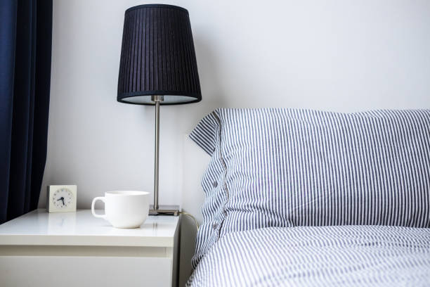 istock White dark blue minimalist bedroom design 917189186