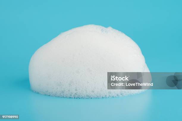 Soap Foam Bubble Isolated On Blue Background Object Beatuy Health Care Concept Stock Photo - Download Image Now