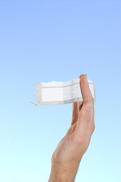 Hand holding paper stock photo