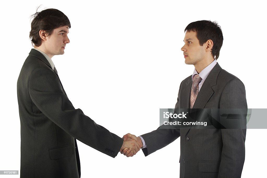 Dois jovem Empresário Apertar a Mão - Royalty-free Abanar Foto de stock