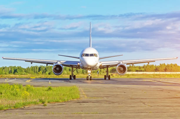 istock Airplane in the sky above the clouds flight journey sun height 917202340