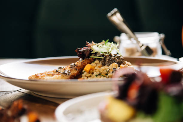istock Dinner. Chef's specialty presented in restaurant on served table. Clouse up. Rustic style 917202470
