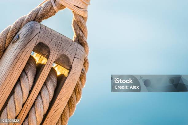 Sailing Boat Pulley Block And Tackle With Moored Nautical Rope Stock Photo  - Download Image Now - iStock