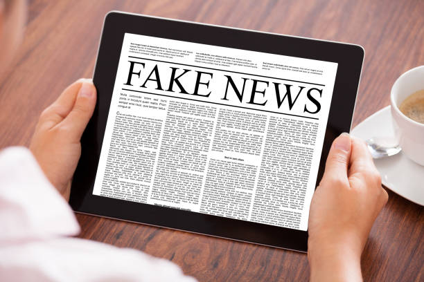 istock Woman Looking At News Article 917203168