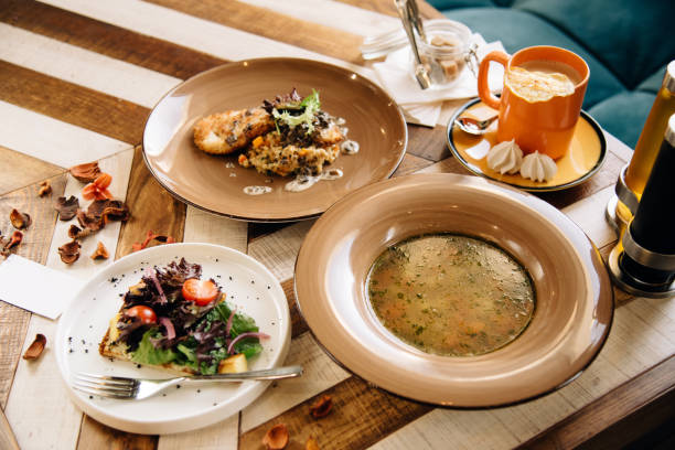 istock Set dinner of three courses. Chef's specialty presented in restaurant on served table. Clouse up. Rustic style 917203216