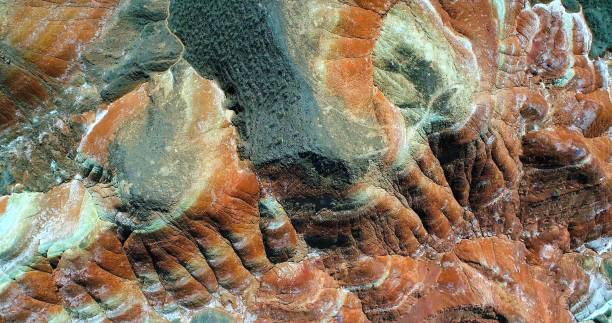 Multicolored pattern created by nature World’s most beautiful places. Aerial view on Rainbow mountains in Zhangye National Geopark displaying multicolored pattern. Gansu province, China. zhangye danxia geopark china stock pictures, royalty-free photos & images