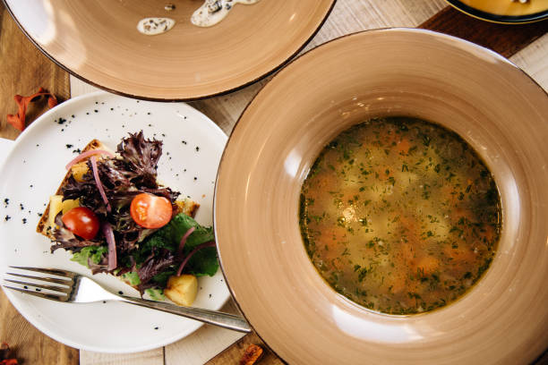 istock Set dinner of two courses. Chef's specialty presented in restaurant on served table. Clouse up. Rustic style 917203572