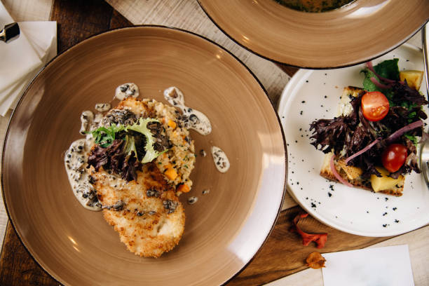 istock Dinner. Chef's specialty presented in restaurant on served table. Clouse up. Rustic style 917203764