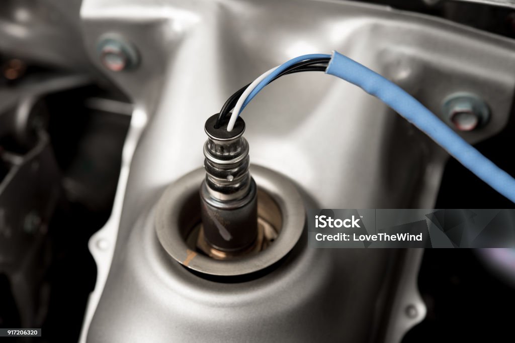 Oxygen sensor on new modern ca Sensor Stock Photo