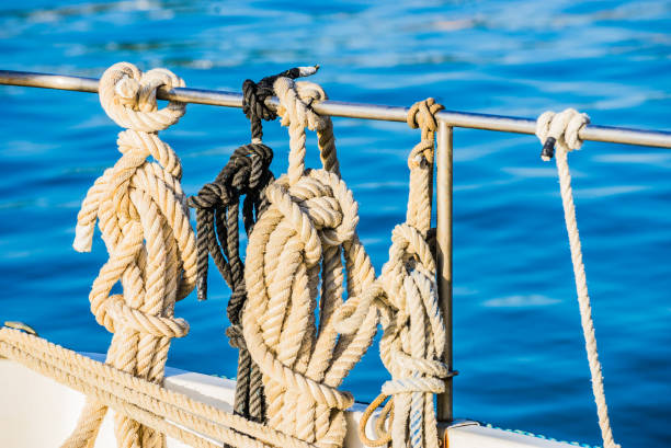 istock Nautical ropes moored on railing of sailing boat deck 917206702