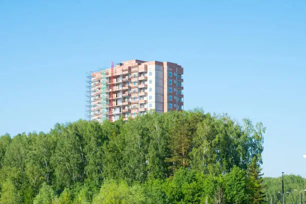 highrise residential building in forest