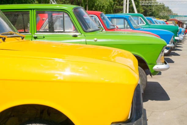 istock retro colorful automobiles in row 917210596