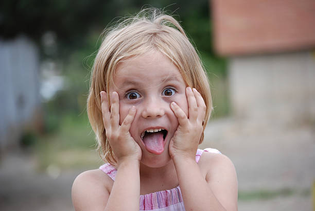 Portrait of a cute happy girl, joyful expression, adorable smile