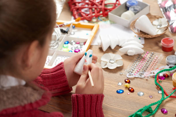 istock Child make crafts and toys, handmade concept. Artwork workplace with creative accessories. 917211168
