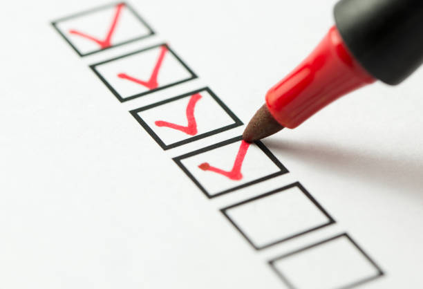Checklist box Checklist marked red with a red pen checklist photos stock pictures, royalty-free photos & images