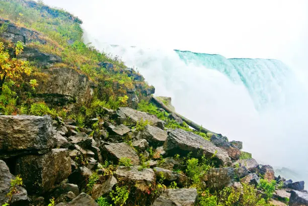 Photo of The edge of Niagara Falls at American side in autumn