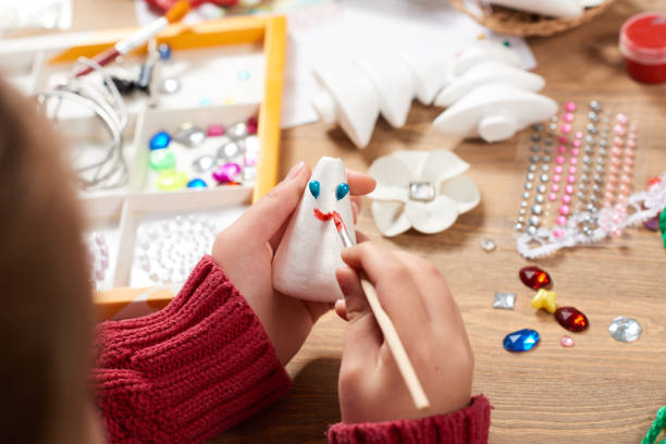 istock Child make crafts and toys, handmade concept. Artwork workplace with creative accessories. 917213916