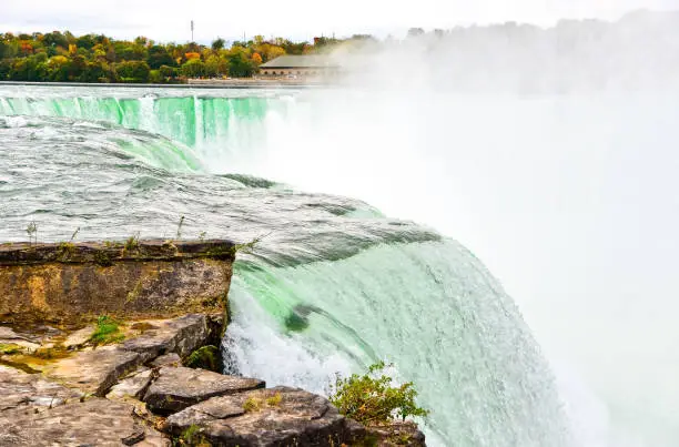 Photo of The edge of Niagara Falls at American side in autumn