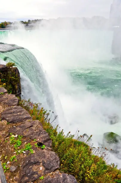 Photo of The edge of Niagara Falls at American side in autumn