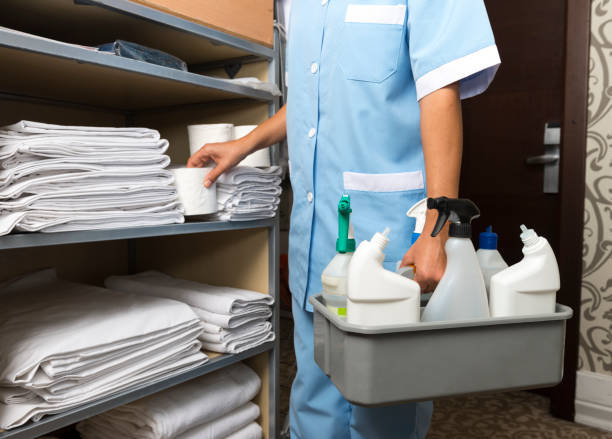 istock Young maid cleaning the hotel rooms 917218146