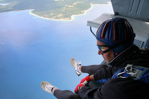 istock Parachuter before jump from the helicopter 91721862