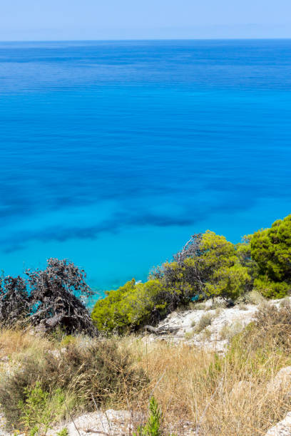istock Panoramic view of Kokkinos Vrachos Beach with blue waters, Lefkada, Greece 917220554