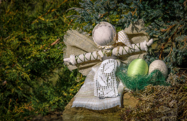 wonderful Easter background. Easter eggs and angel doll, handmade. Spring sunny day. Easter theme. happy Easter