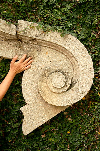Hand on a old ornament stock photo