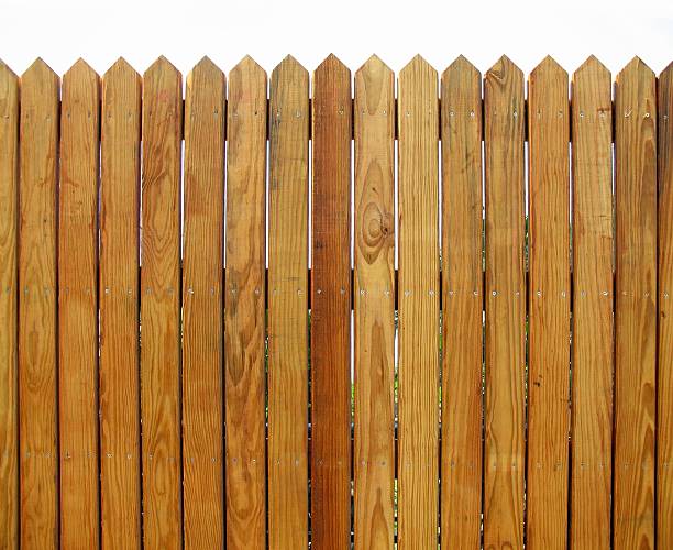 istock Wooden picket fence in front of white background 91722733