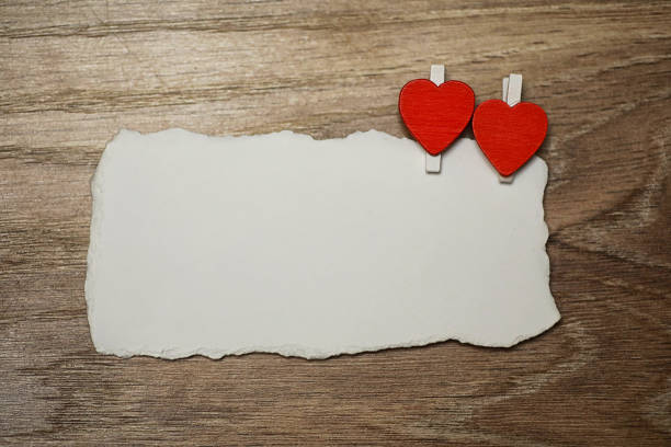 istock white sheet paper love notes and heart shape 917229262