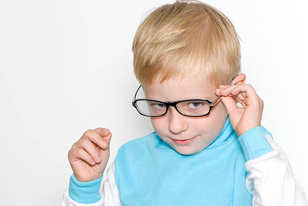 istock The boy in glasses on a light background 91723094
