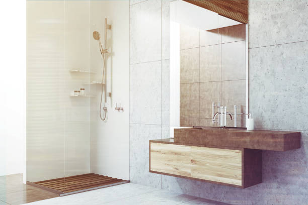 istock Gray bathroom with a sink, a shower toned 917232530