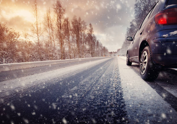 winter road in the morning car on winter road in the morning car snow stock pictures, royalty-free photos & images
