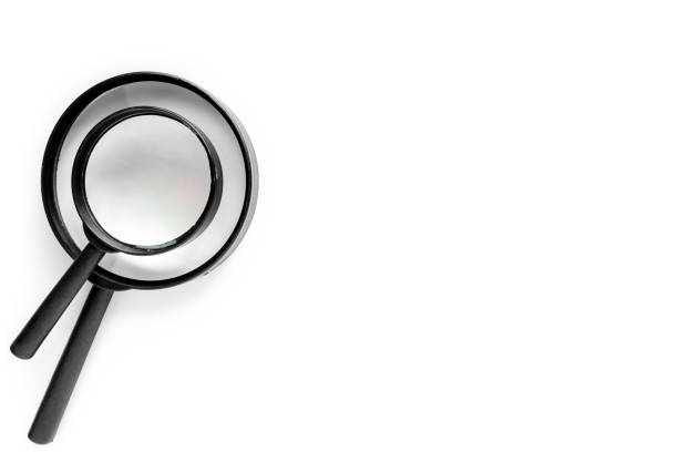 istock Two size of magnifying glass on the left of white background with copy space 917233670