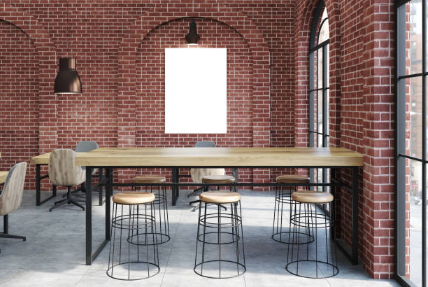 istock Brick cafe, wooden tables and a poster 917236726