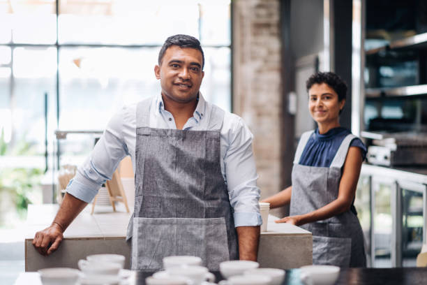 istock Husband and wife running the cafe bar 917237278