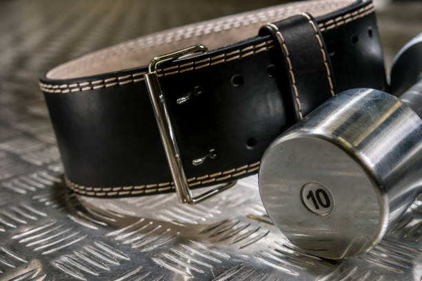 istock black leather strap and chrome dumbbells athletes gym Big 917237414