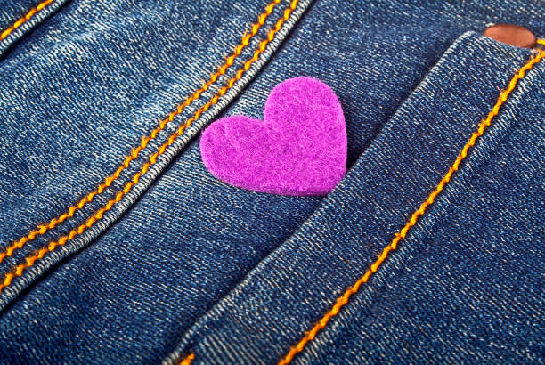 istock Purple heart in jeans pocket 917238996