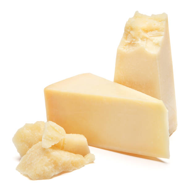 istock Piece of parmesan cheese on white background 917250586