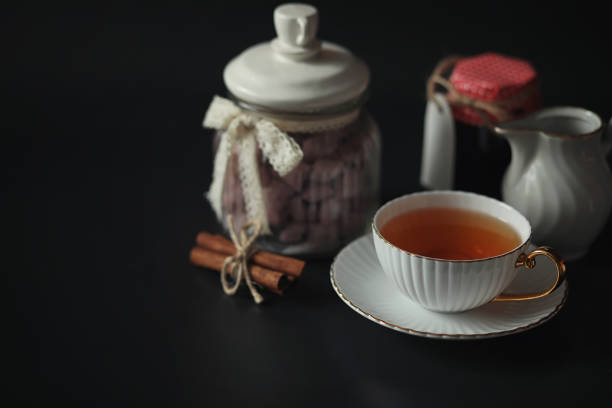 transparent glass Cup with tea isolated on white.